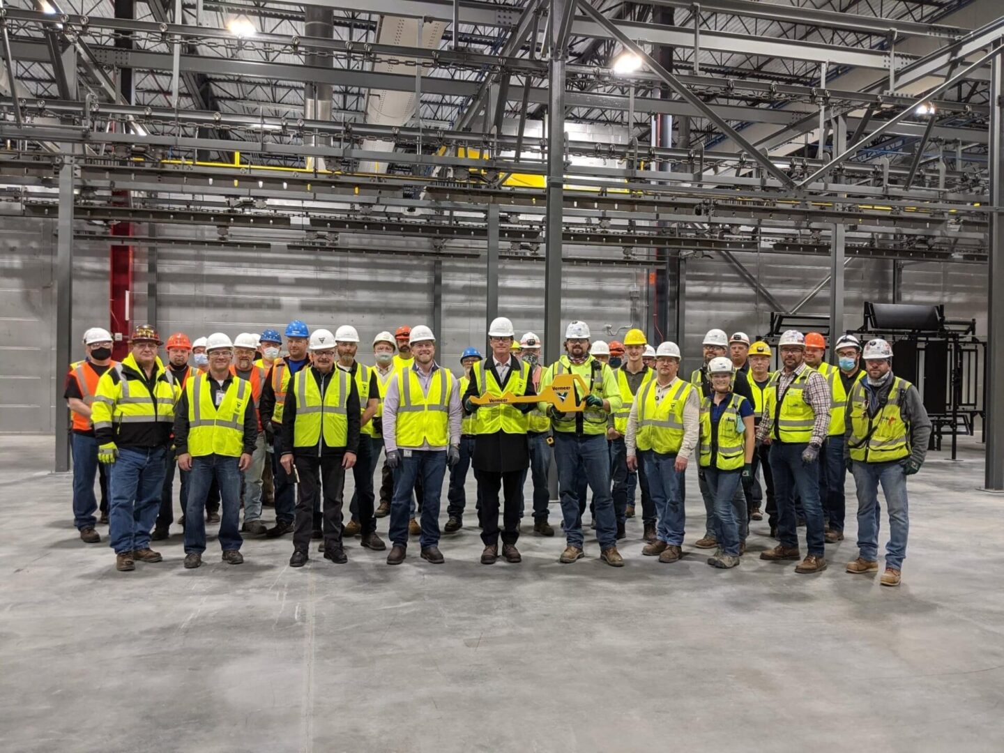 A close-up shot of the Staff of Engineered Conveyors Inc